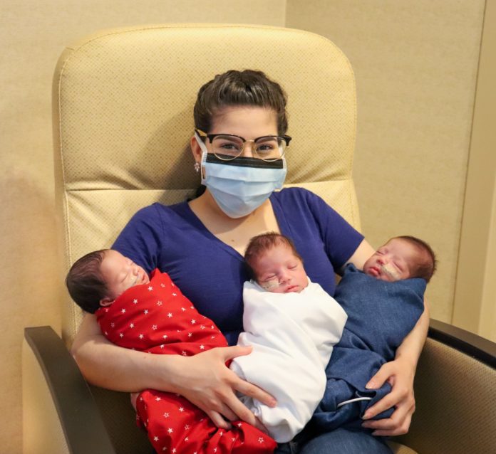 Texas mother with her newborn triplets after beating coronavirus